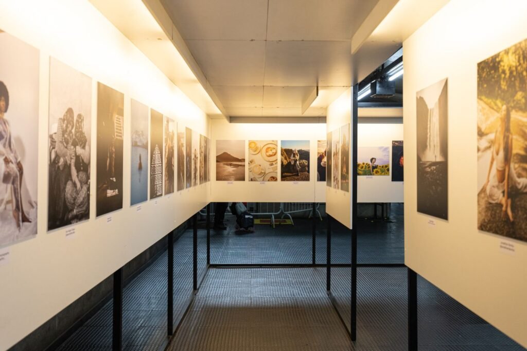 A long gallery room with work hung on both walls