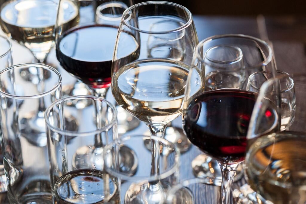Wine glasses filled and grouped on a table