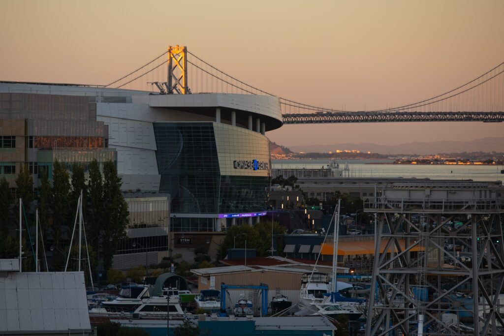 Chase Center and the Bay Bridge at sunset, Mission Bay, San Francisco