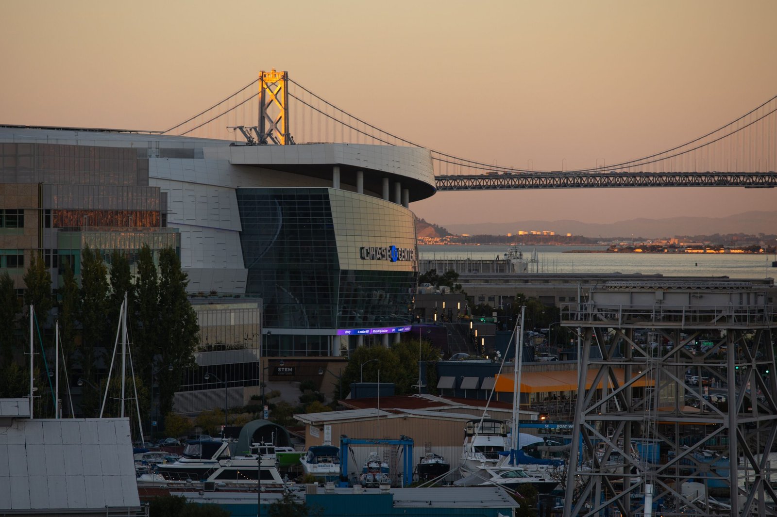 Chase Center and the Bay Bridge at sunset, Mission Bay, San Francisco