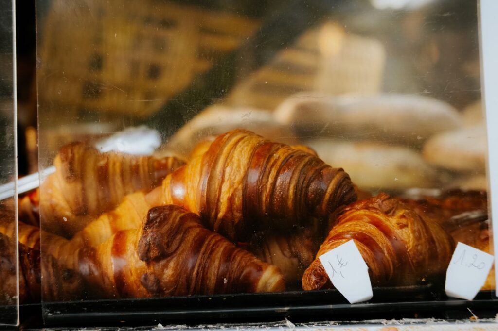 Croissants in a bakery display case