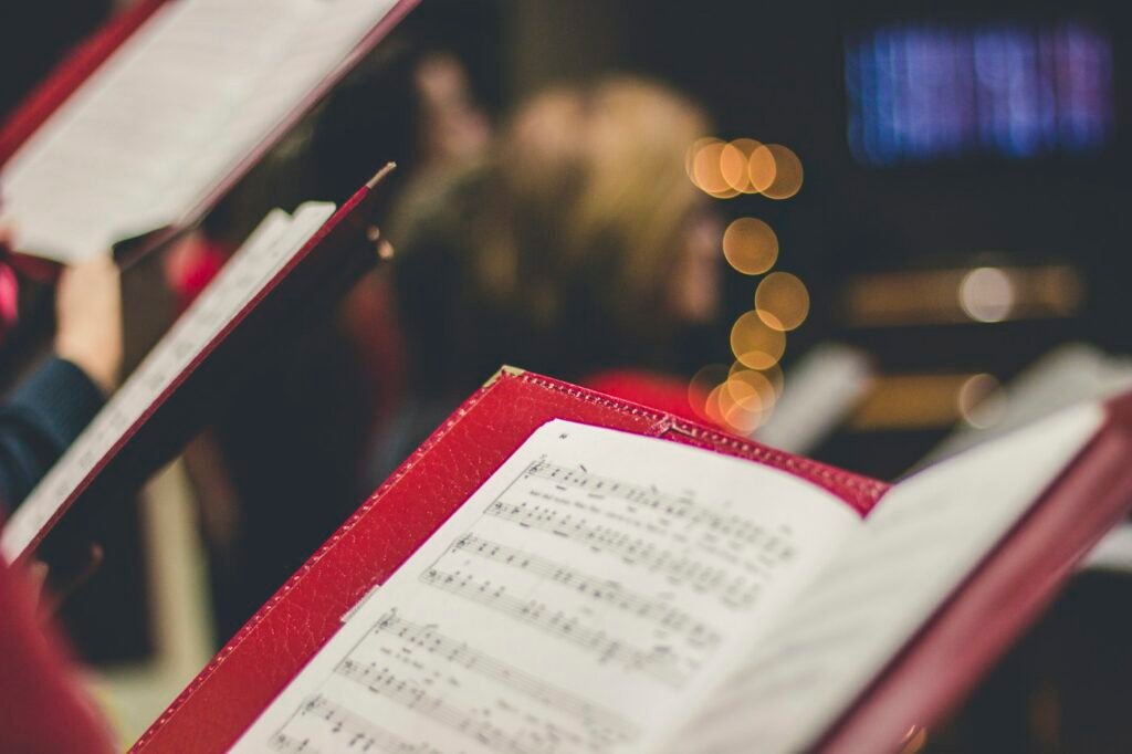 Sheet music with warm holiday lights