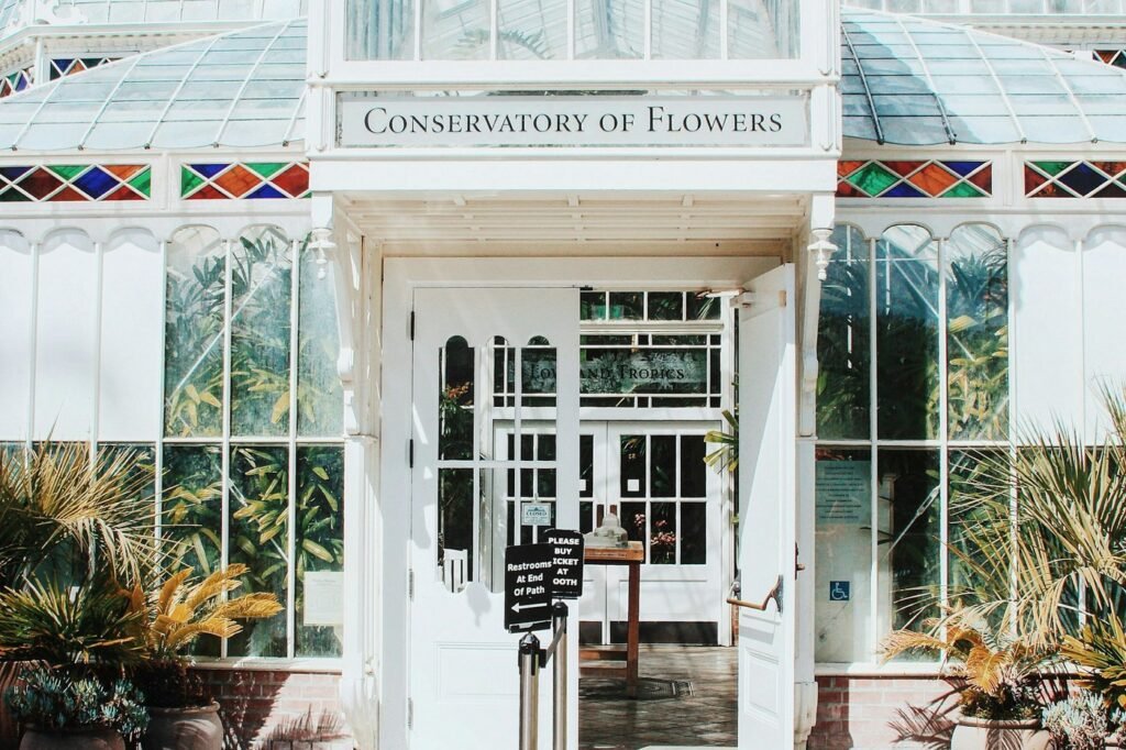 The white entrance of the Conservatory of Flowers in Golden Gate Park.