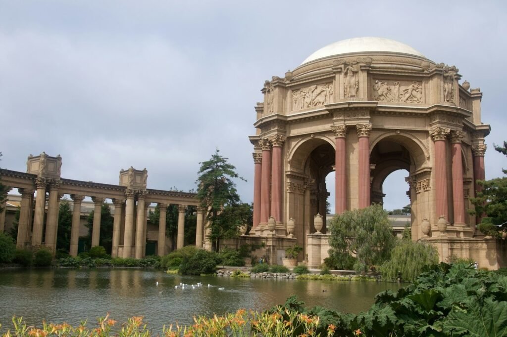 The Palace of Fine Arts rotunda and colonnade beside its lagoon in San Francisco.