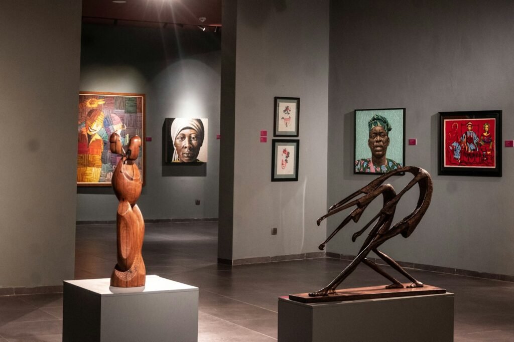 Sculptures and paintings in a museum gallery