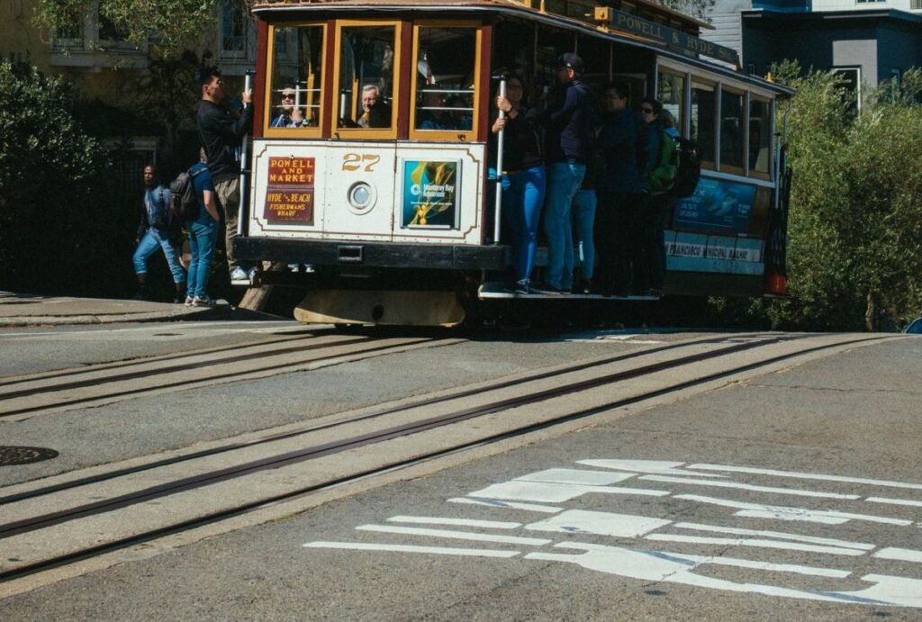 A San Francisco cable car stopped on its tracks on a sunny day