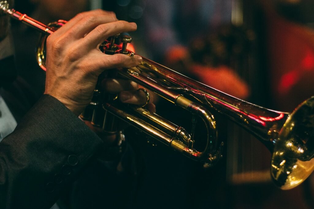 Trumpet played in warm stage light
