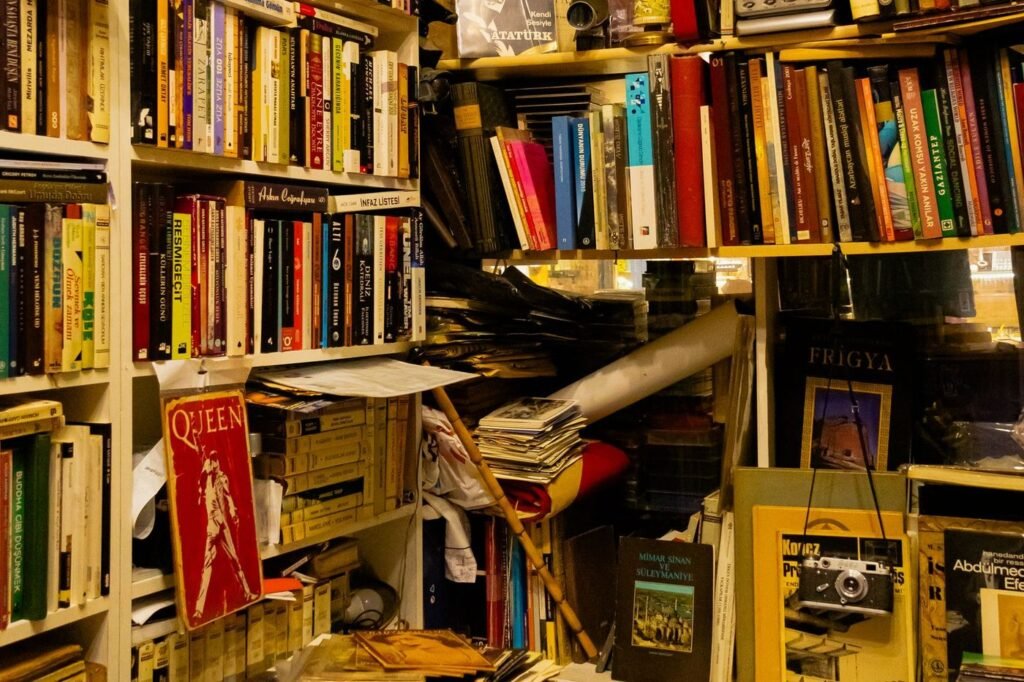 Crowded used-book shelves packed floor to ceiling