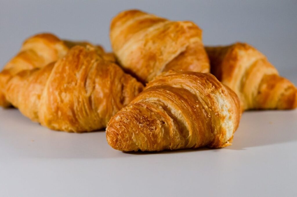 Freshly baked golden croissants