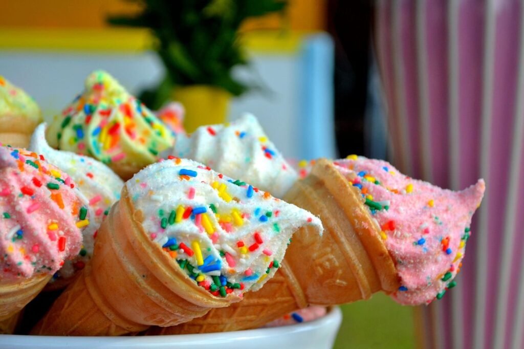 Ice cream cones topped with rainbow sprinkles