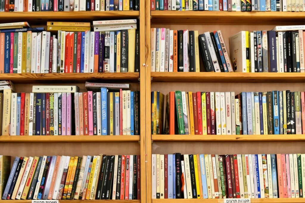 Wooden library shelves filled with colorful children's books